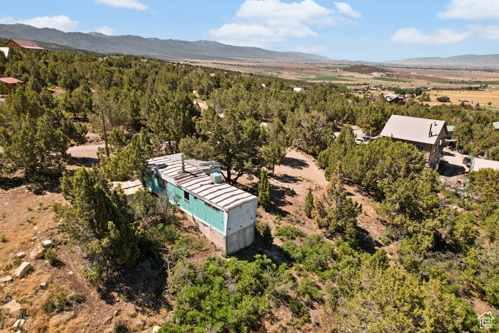 View of subject property featuring a mountain backdrop