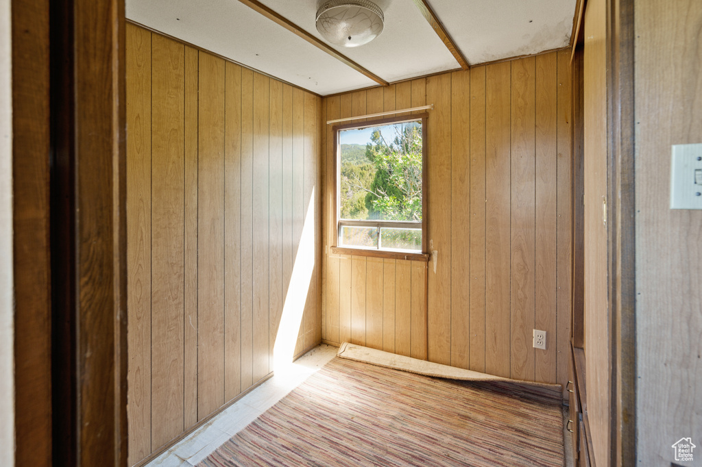 Empty room with wooden walls