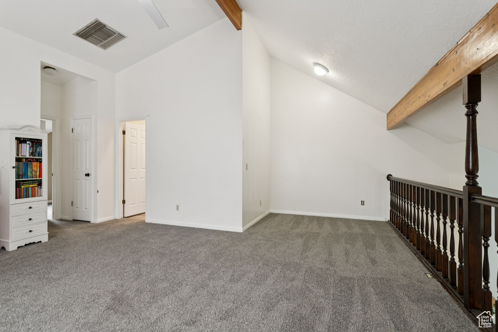 Unfurnished living room with carpet flooring