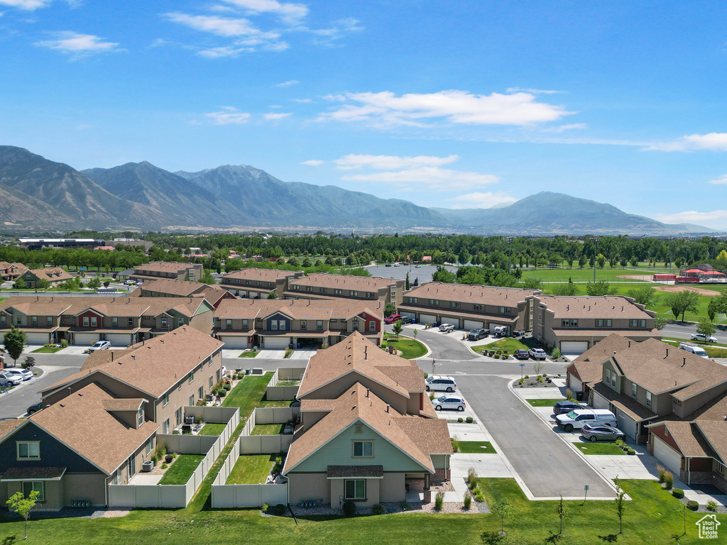 Aerial view of residential area with a mountainous background