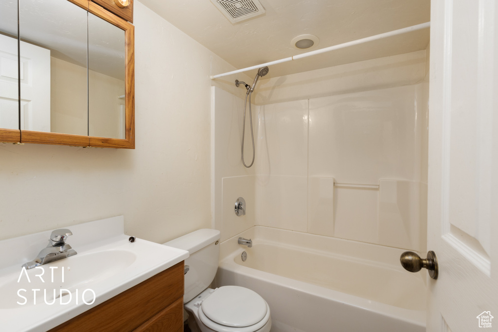 Full bathroom featuring tub / shower combination and vanity