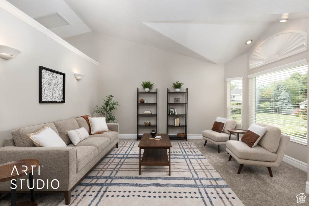 Carpeted living area with vaulted ceiling and baseboards