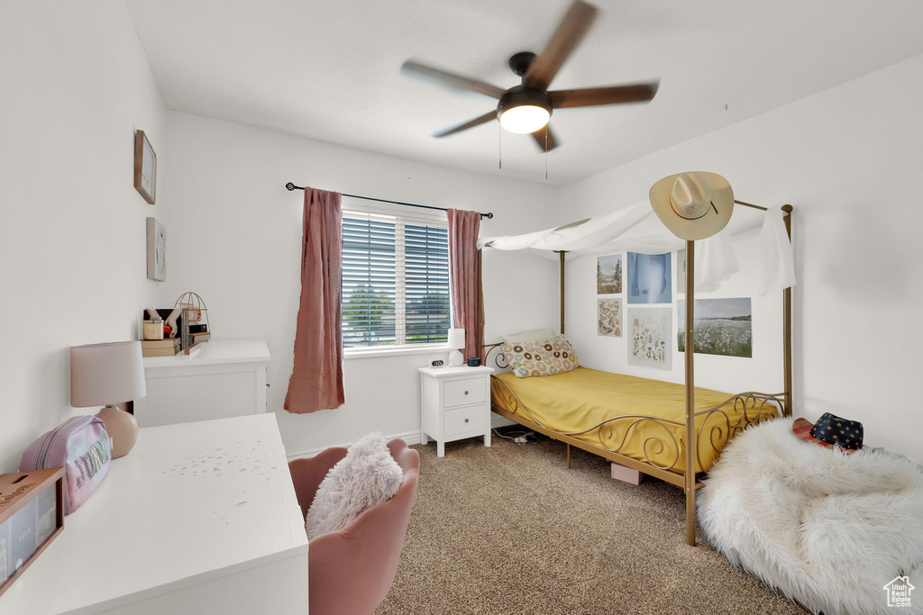 Bedroom featuring carpet flooring and a ceiling fan