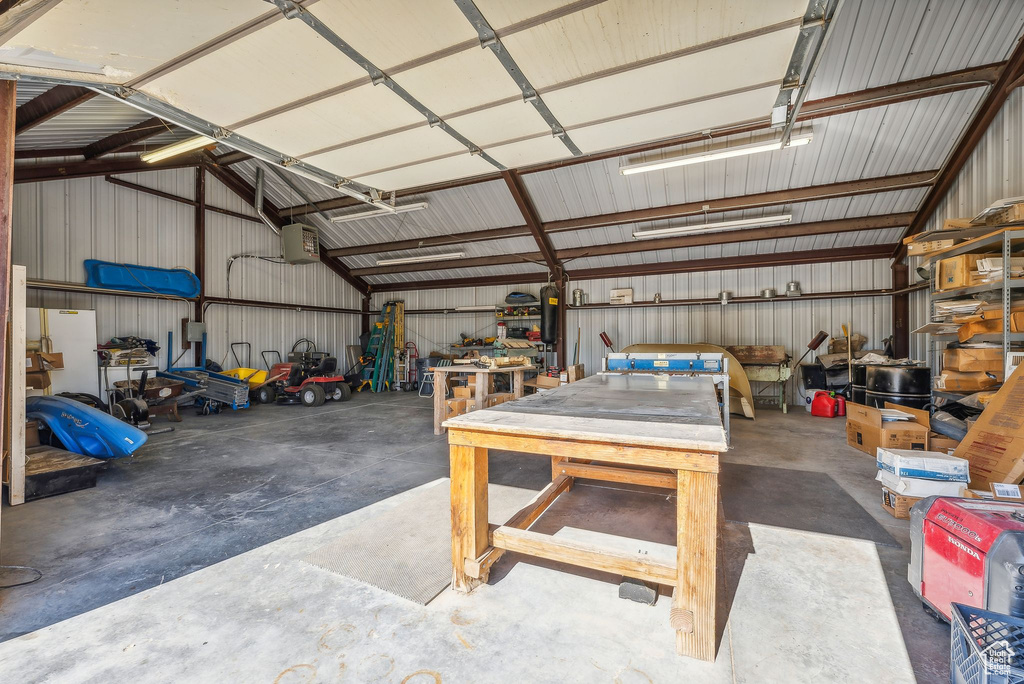 Garage featuring metal wall