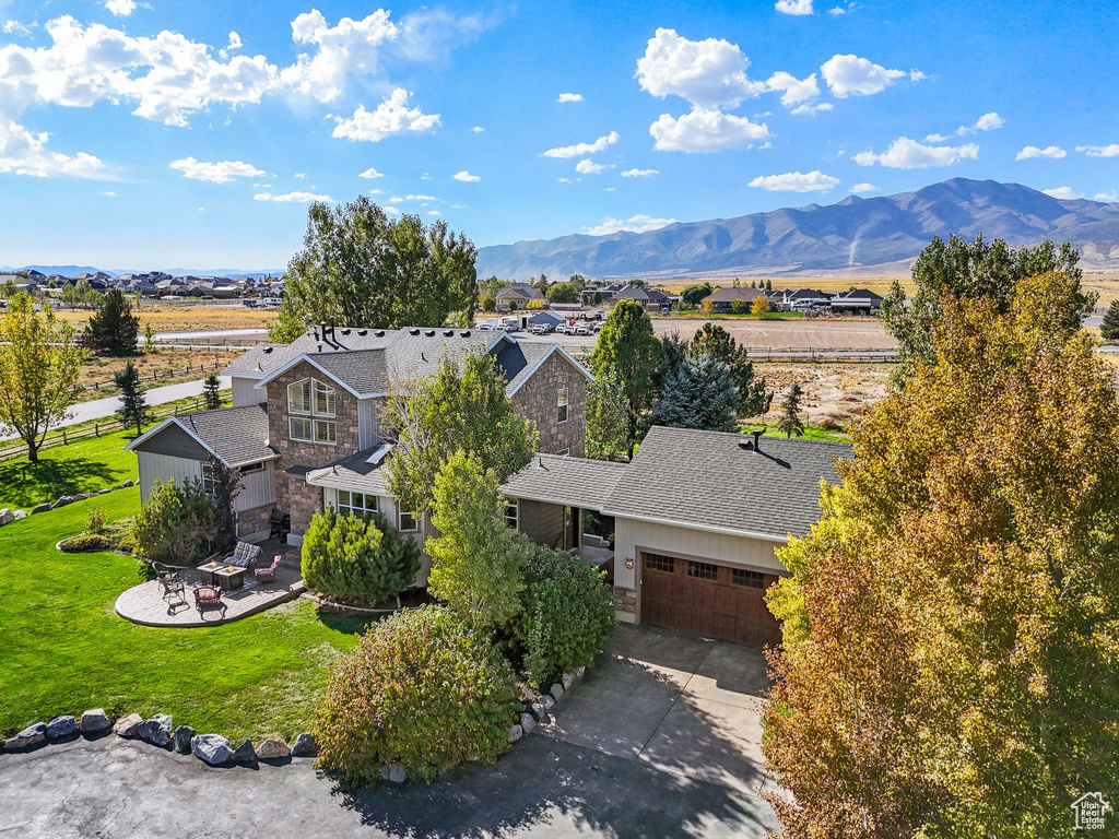 View of subject property featuring mountains