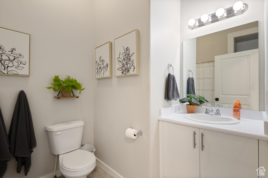 Bathroom with toilet and vanity