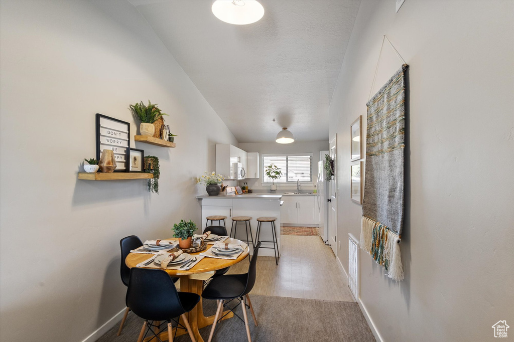 Dining space featuring baseboards