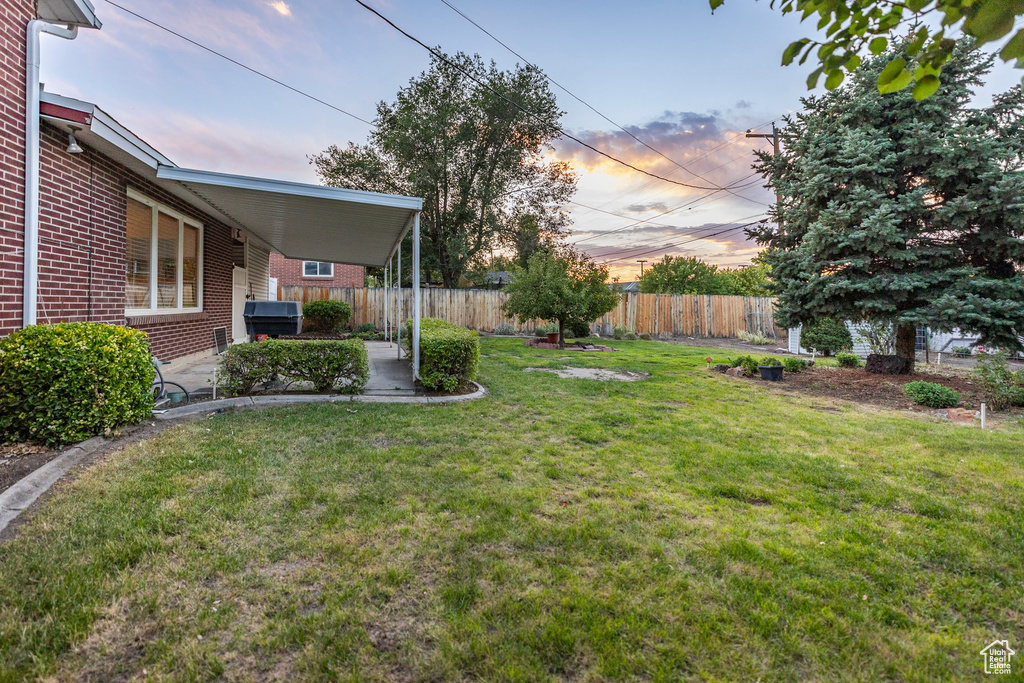 View of yard with a patio