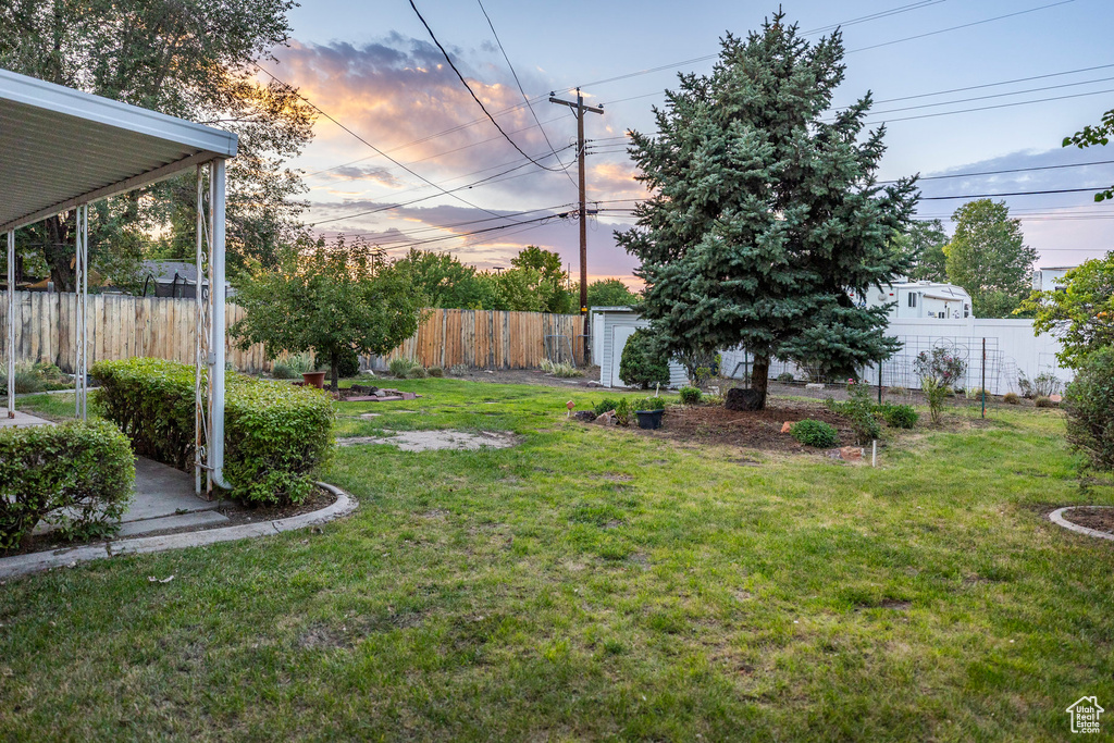 View of fenced backyard