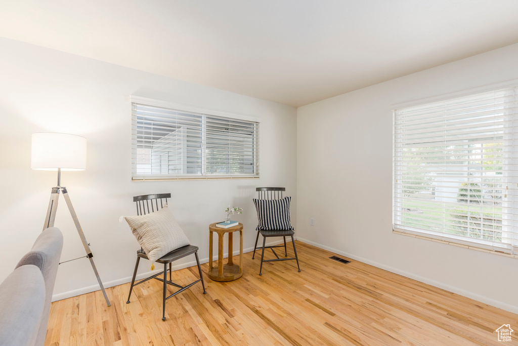 Living area featuring wood finished floors and baseboards