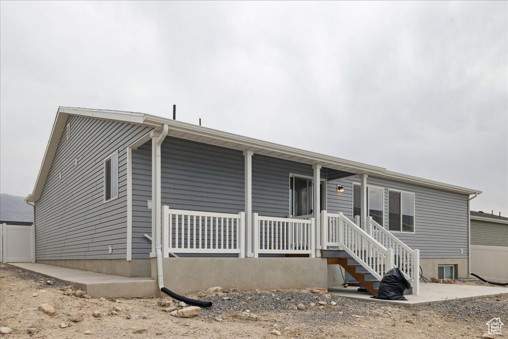 View of front of house with covered porch