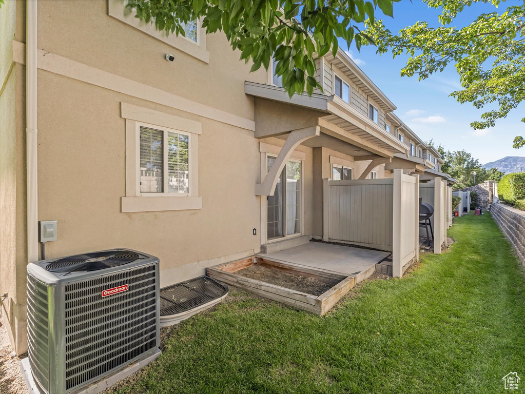Back of property featuring stucco siding and a mountain view