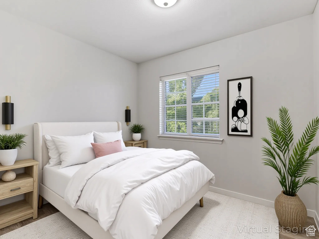 Bedroom with baseboards