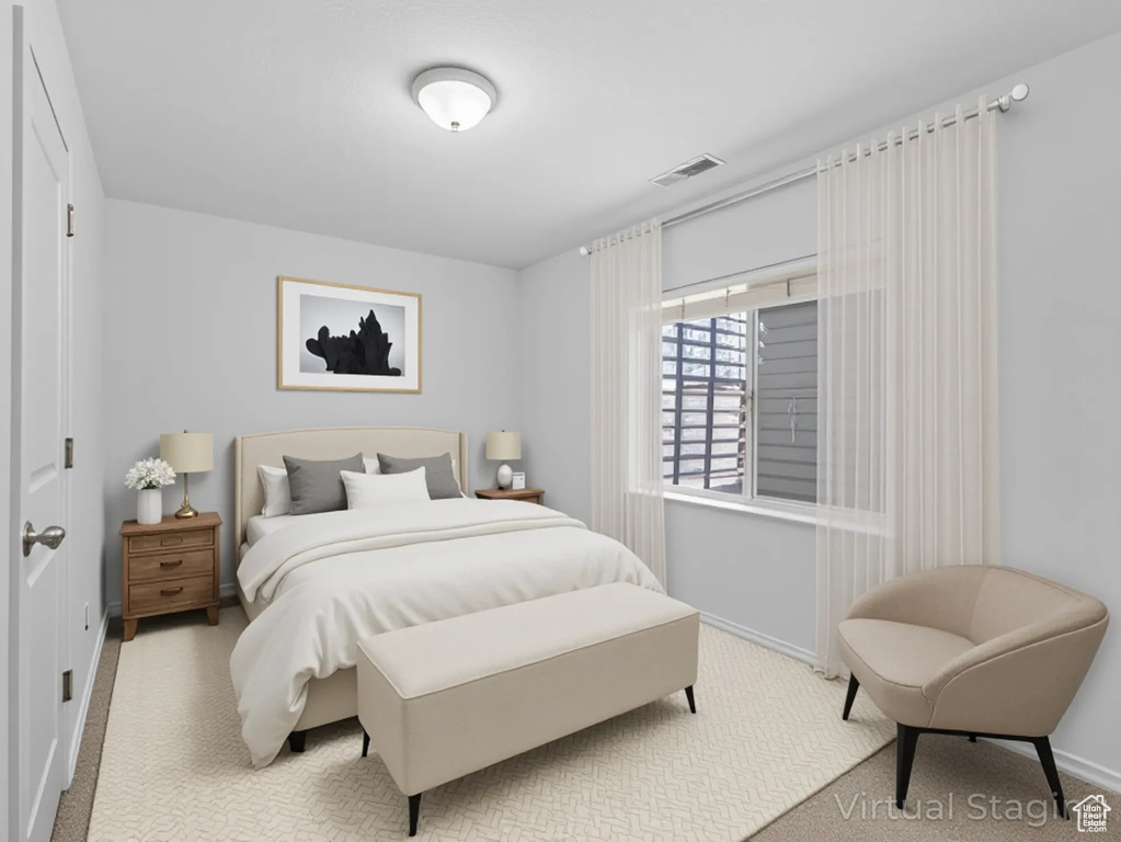 Bedroom with carpet