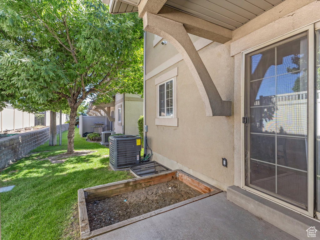 Property entrance with stucco siding