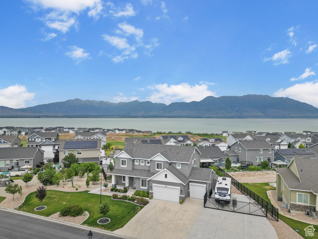 Aerial view of residential area with a water and mountain view