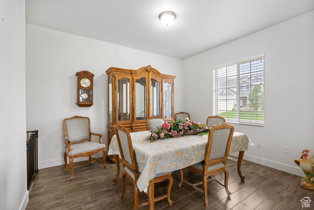 Dining area with wood finished floors