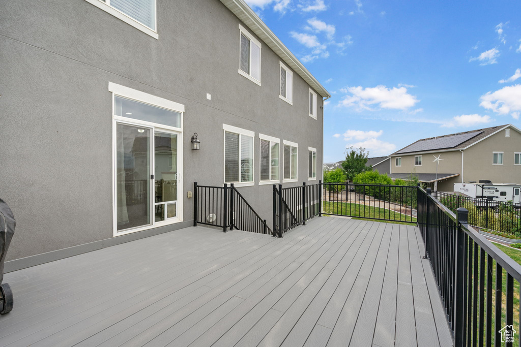 Wooden deck with a residential view