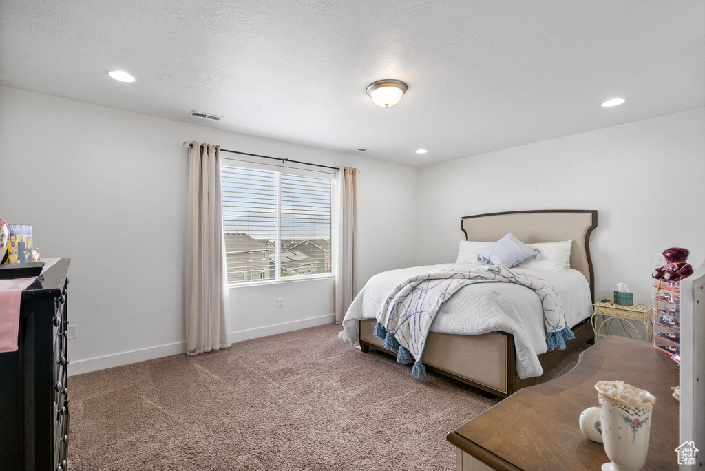 Bedroom featuring carpet floors and recessed lighting