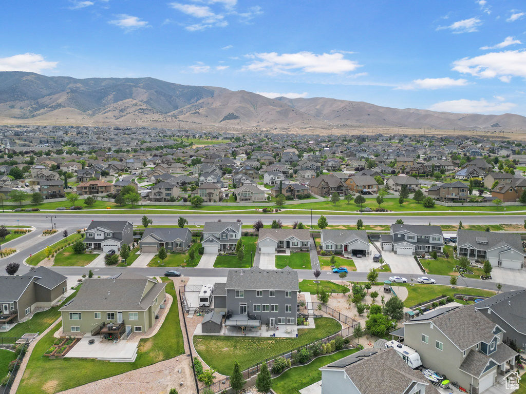Aerial view of residential area with mountains