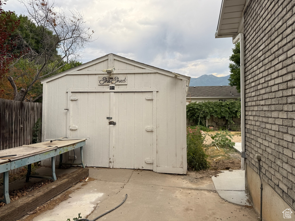 View of shed featuring a mountain view