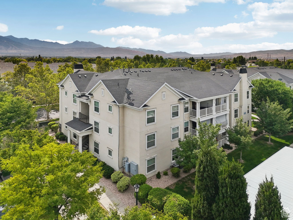 View of subject property featuring mountains