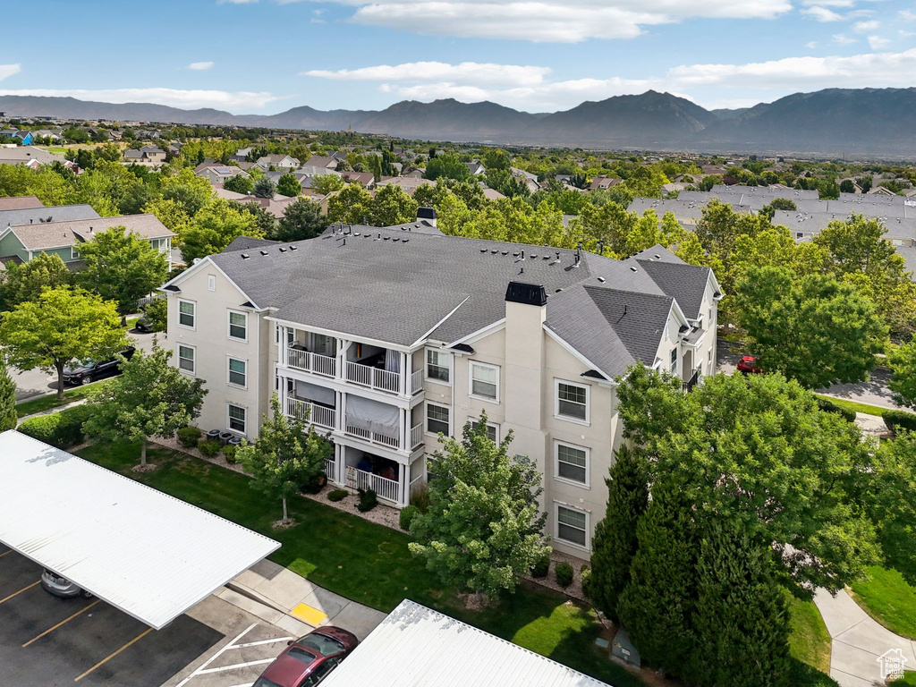 Aerial view of residential area with a mountainous background