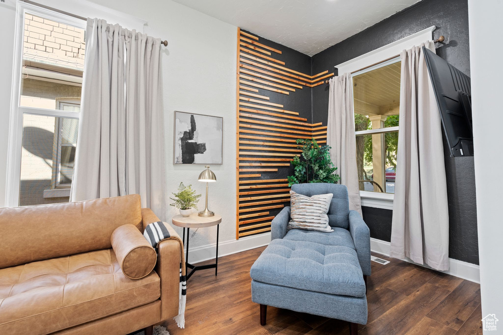 Living area with wood finished floors