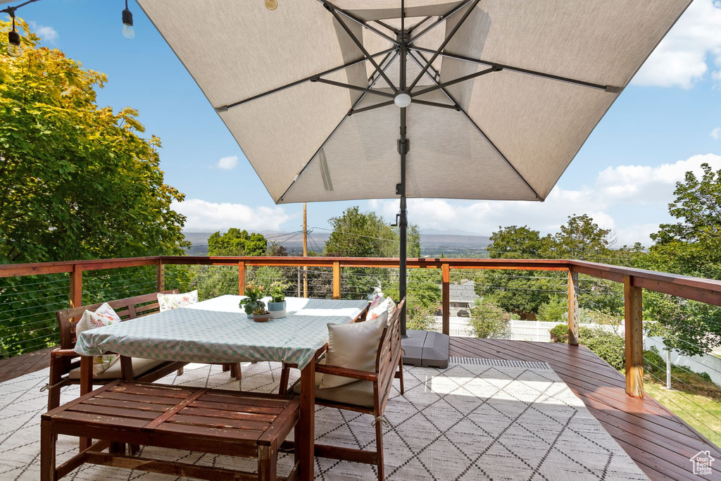 Wooden terrace with outdoor dining area