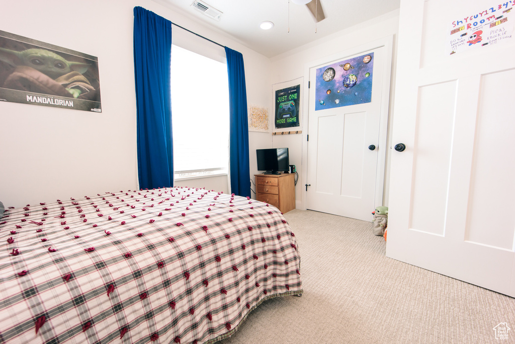 Bedroom with carpet flooring