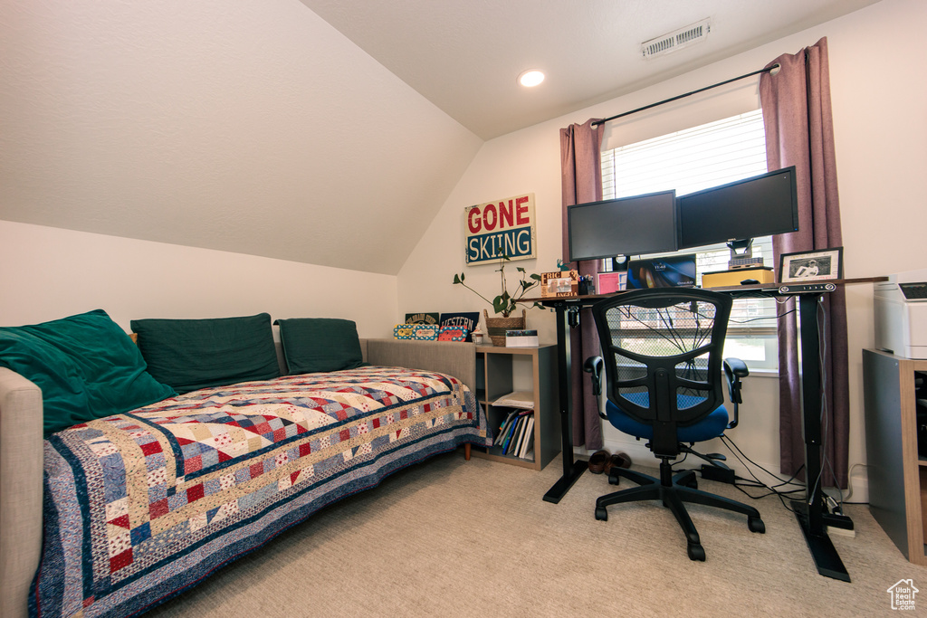 Bedroom featuring lofted ceiling, carpet floors, and recessed lighting
