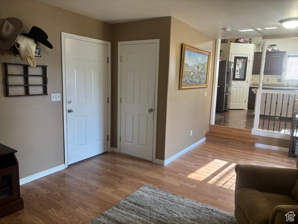 Living area featuring light wood finished floors