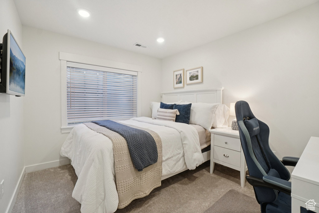 Bedroom featuring carpet floors, an office area, and recessed lighting