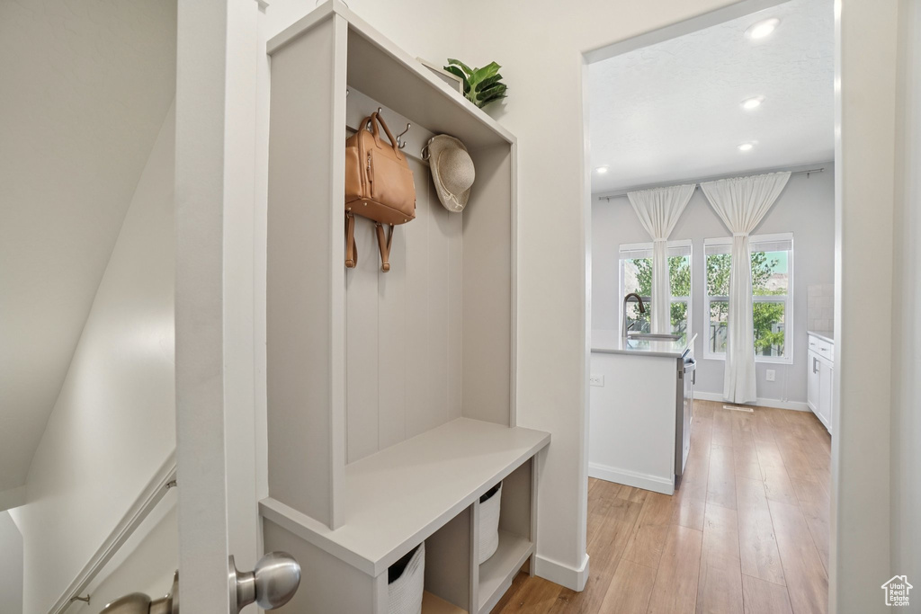 Mudroom featuring recessed lighting and light wood-type flooring