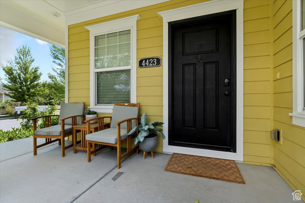 Entrance to property with covered porch