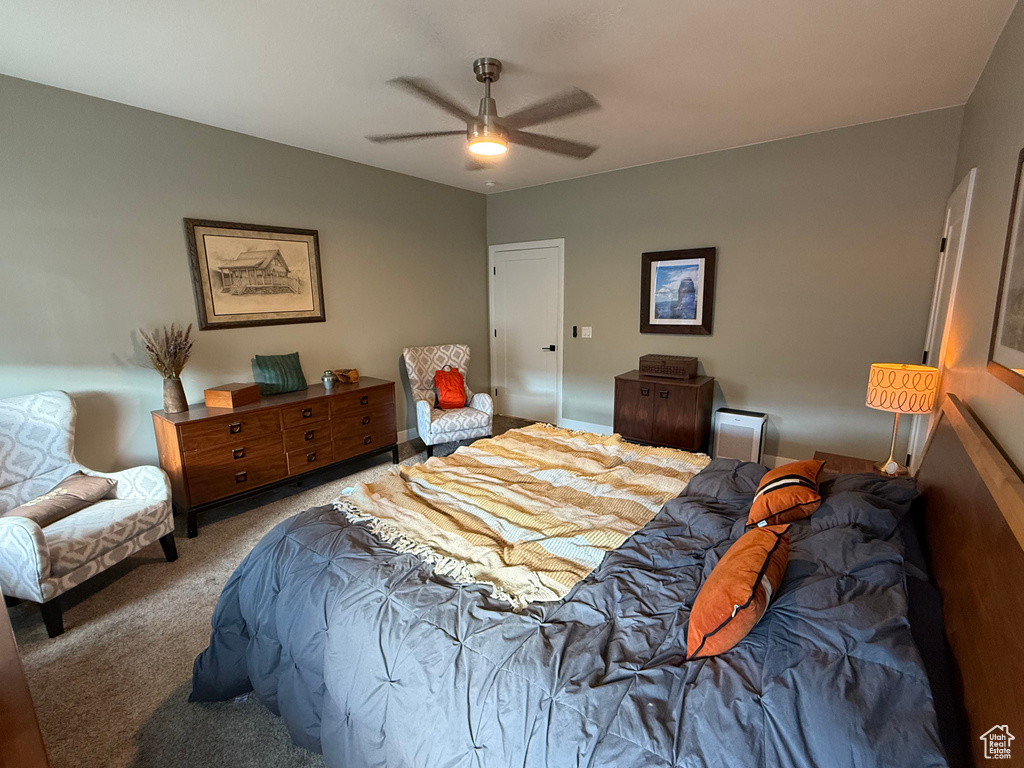 Bedroom featuring carpet floors and a ceiling fan