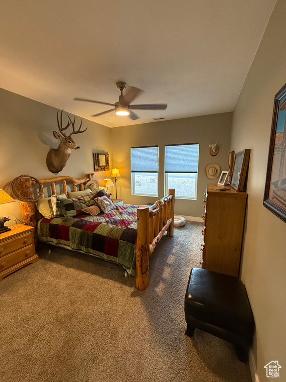 Bedroom with carpet floors and ceiling fan