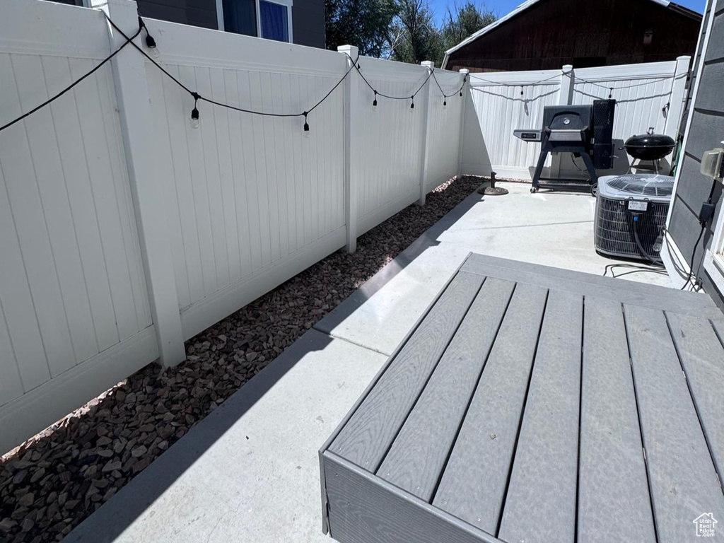 Fenced backyard featuring a patio