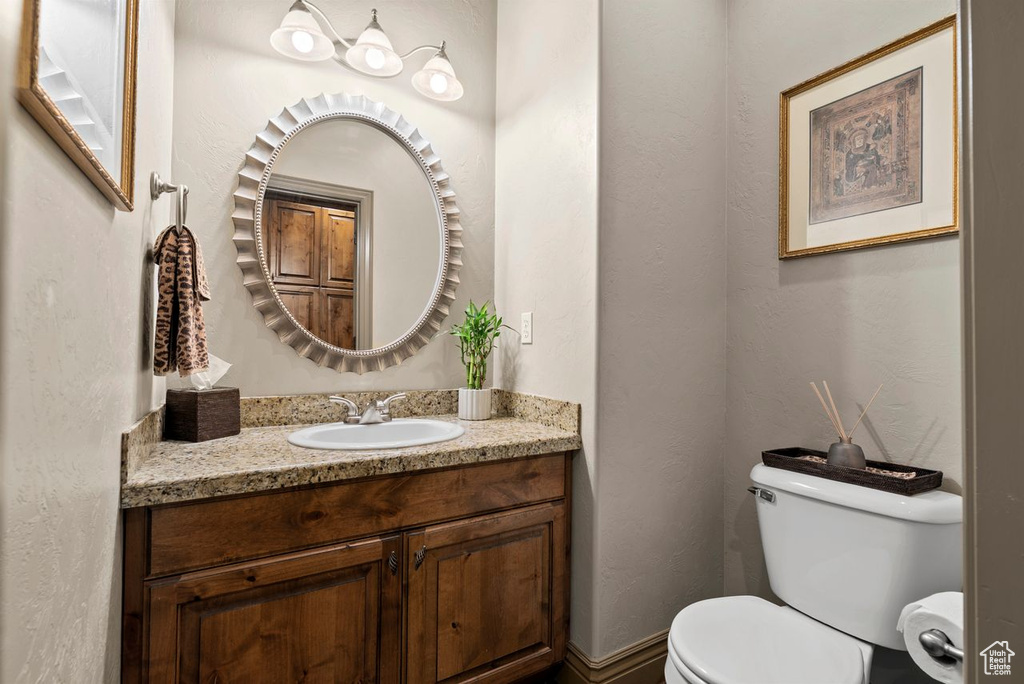 Bathroom featuring toilet and vanity