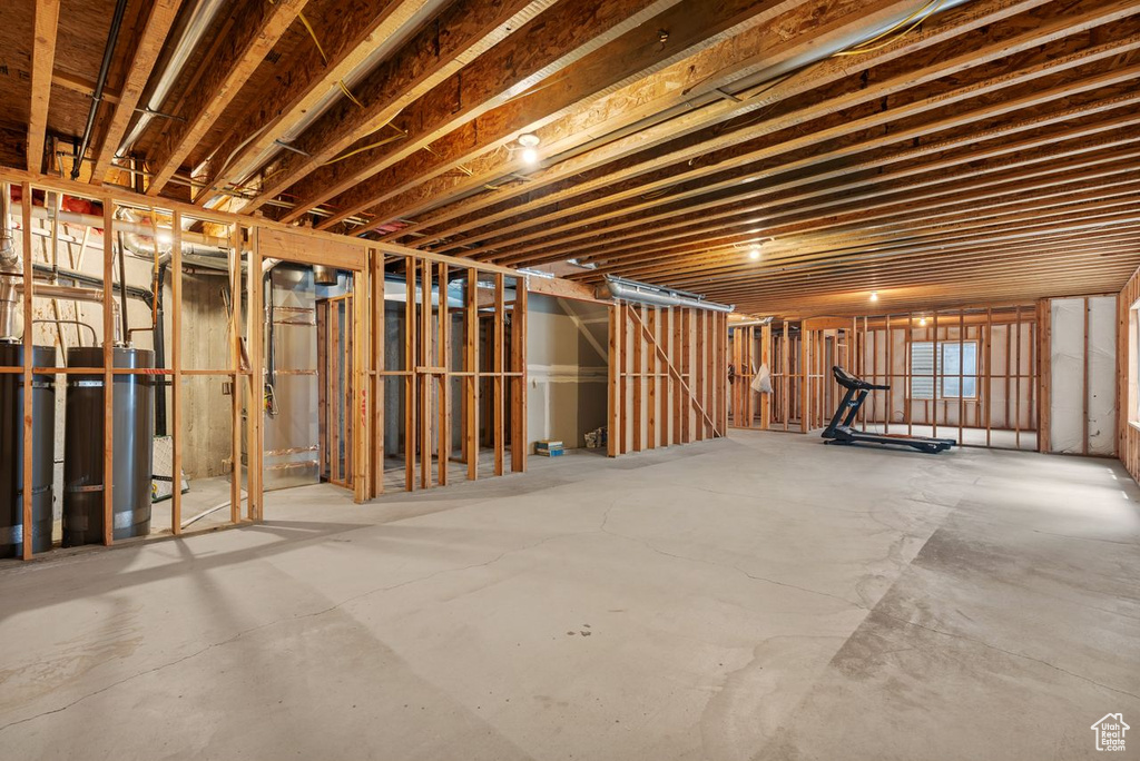 Basement featuring water heater