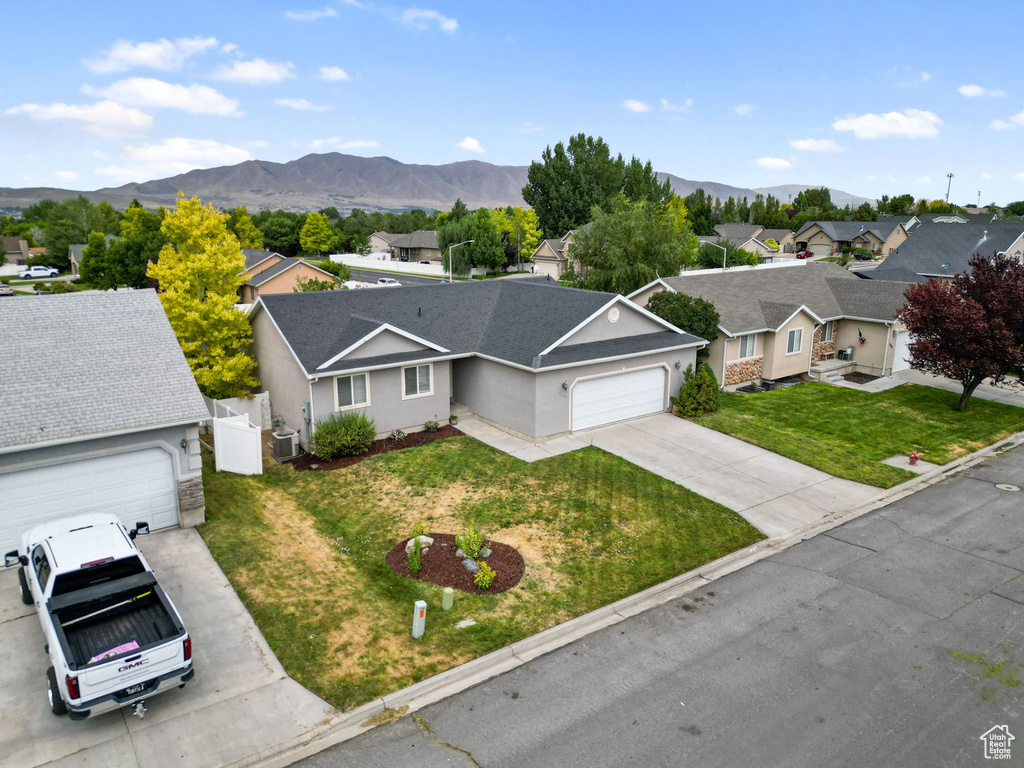 Aerial view of residential area with mountains