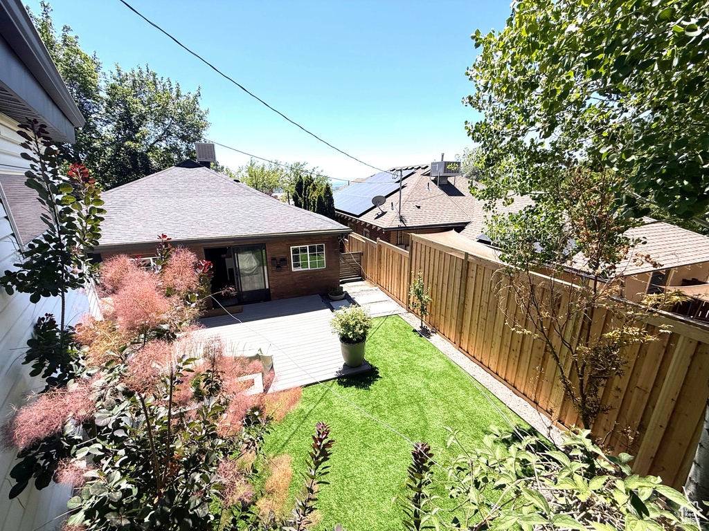 View of fenced backyard