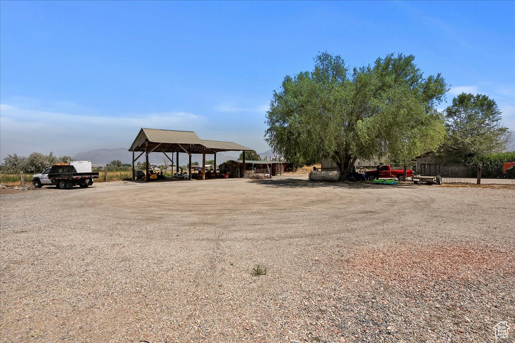 View of yard with a detached carport