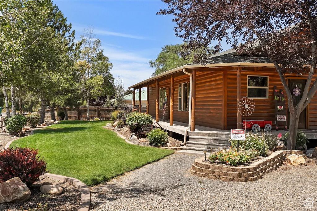 View of side of property with log veneer siding