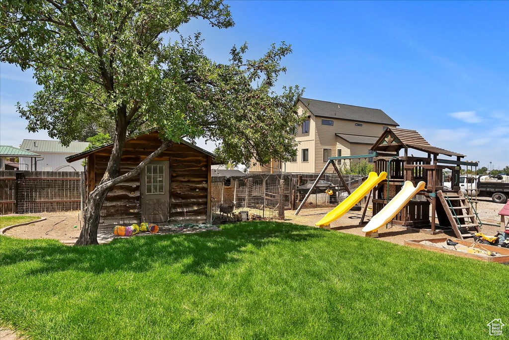 View of yard featuring a playground