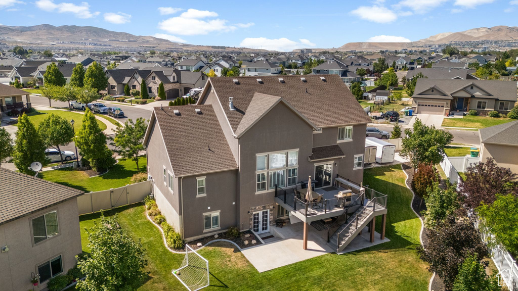 Aerial view of residential area with mountains