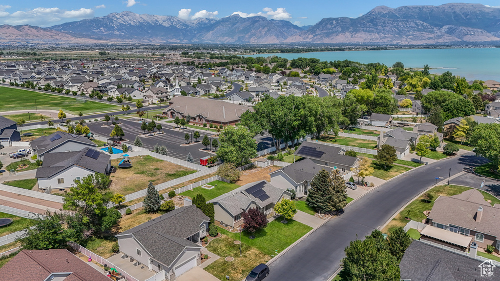 Aerial view of residential area featuring a water and mountain view