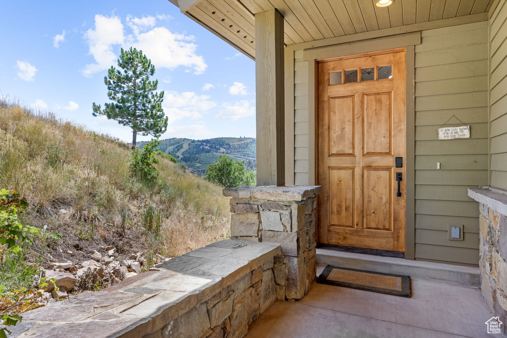 Entrance to property with a mountain view