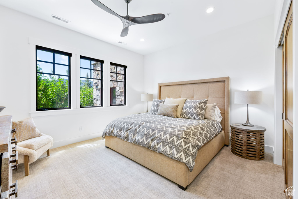 Bedroom featuring carpet flooring, recessed lighting, and ceiling fan