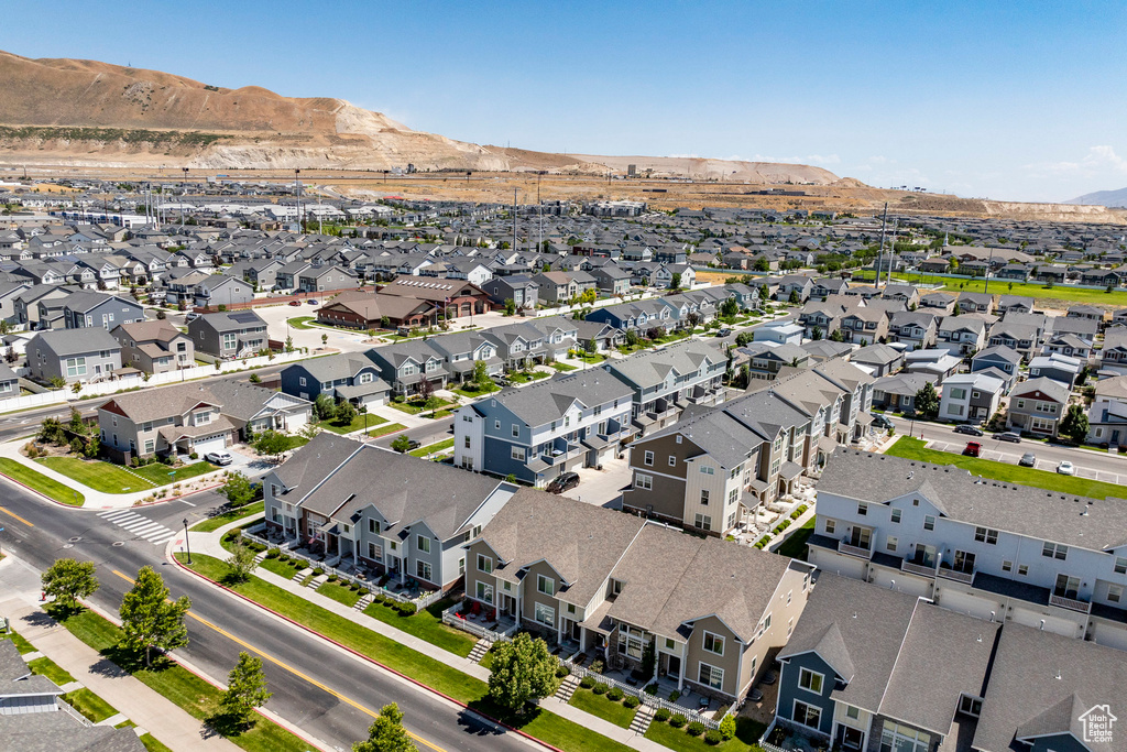 Aerial view of residential area with a mountainous background